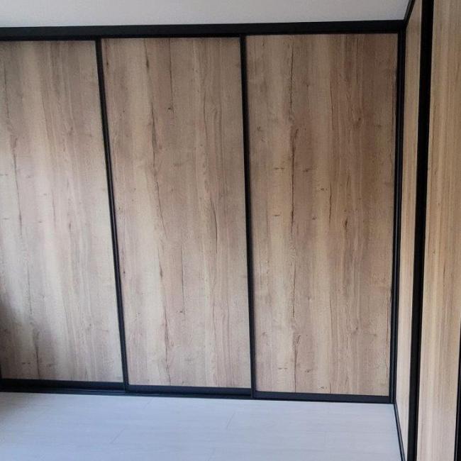 Schuifwandkast eiken in hoekopstelling